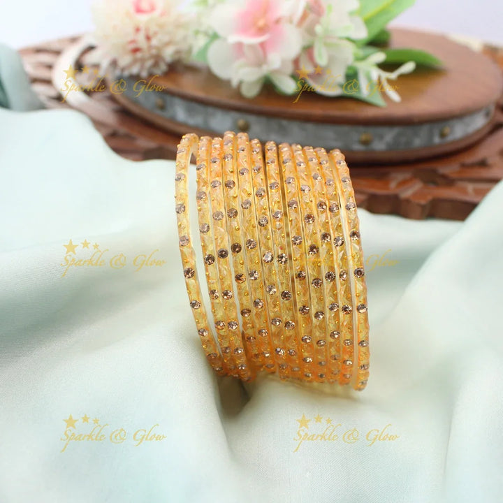 Adorable Glass Bangles with Golden Stone Accents – Set of 12