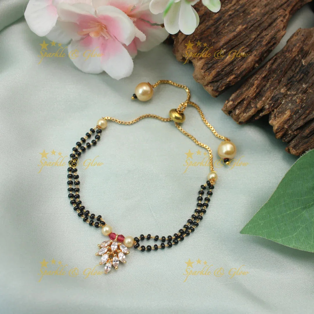 Elegant Adjustable Mangalsutra-style Bracelet with Leaf Cluster CZ Pendant