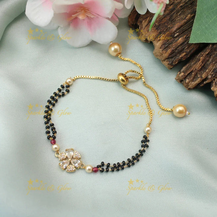Stunning Adjustable Mangalsutra Bracelet with Floral CZ Petal Charm
