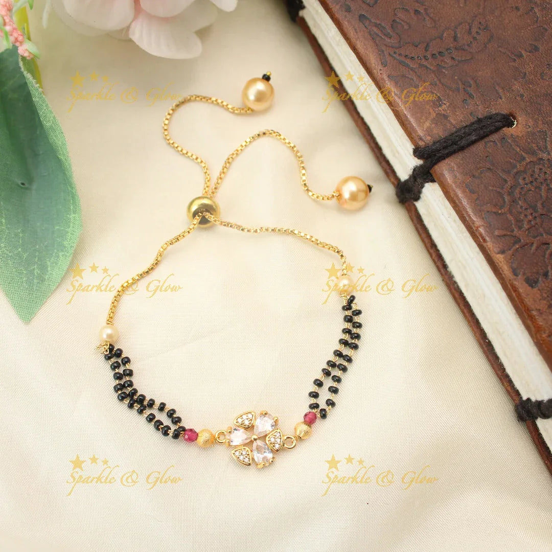 Stunning Adjustable Mangalsutra Bracelet with Floral CZ Petal Charm