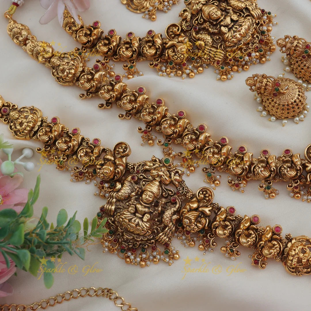 Stunning Budgeted Idol Lakshmi Peacock carved Bridal set