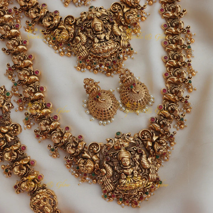 Stunning Budgeted Idol Lakshmi Peacock carved Bridal set