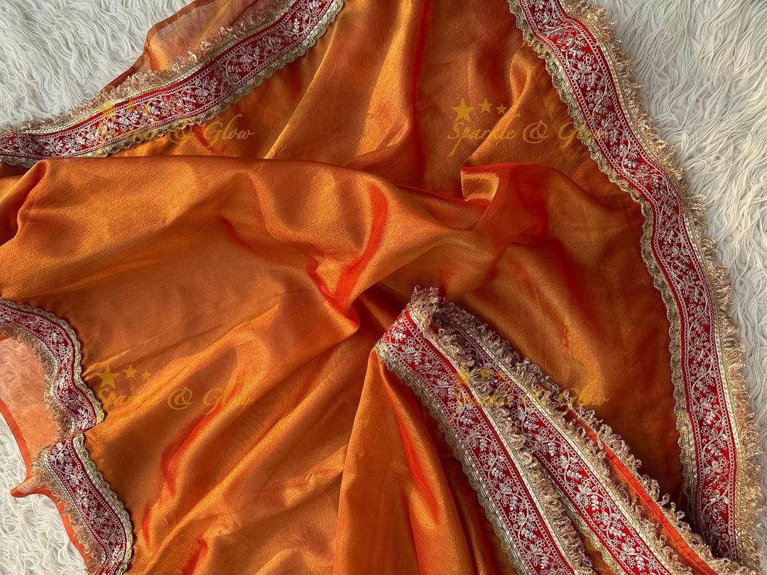 Premium Tissue Maharani Saree with Embroidered Lace Border