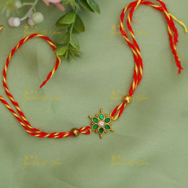 Exquisite Jadau Kundan Rakhi with Floral Motif – Sparkle & Glow