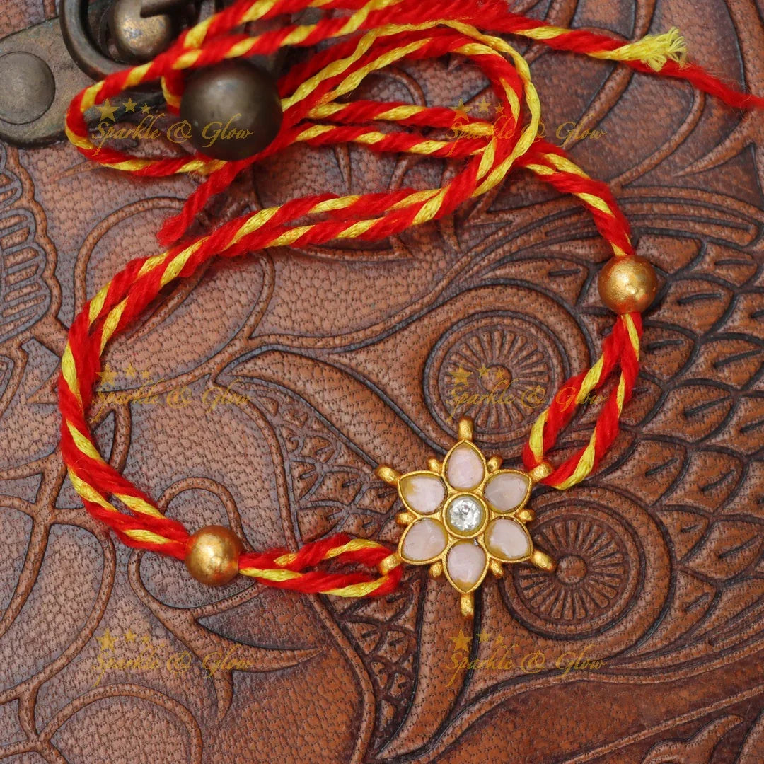 Exquisite Jadau Kundan Rakhi with Floral Motif – Sparkle & Glow