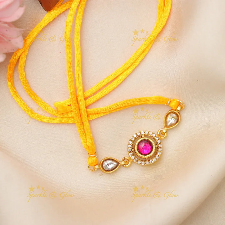 Elegant Jadau Kundan Rakhi - Exquisite Festive Jewelry