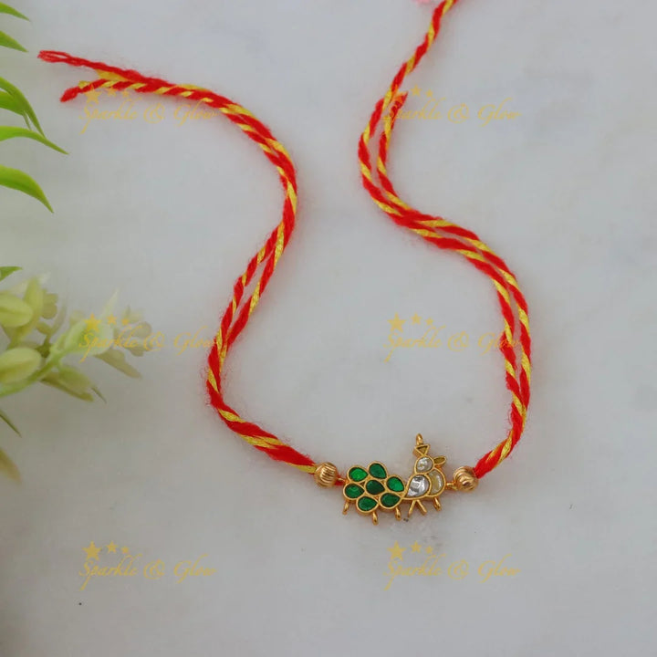 Exquisite Kundan Peacock Rakhi – Perfect Festive Gift