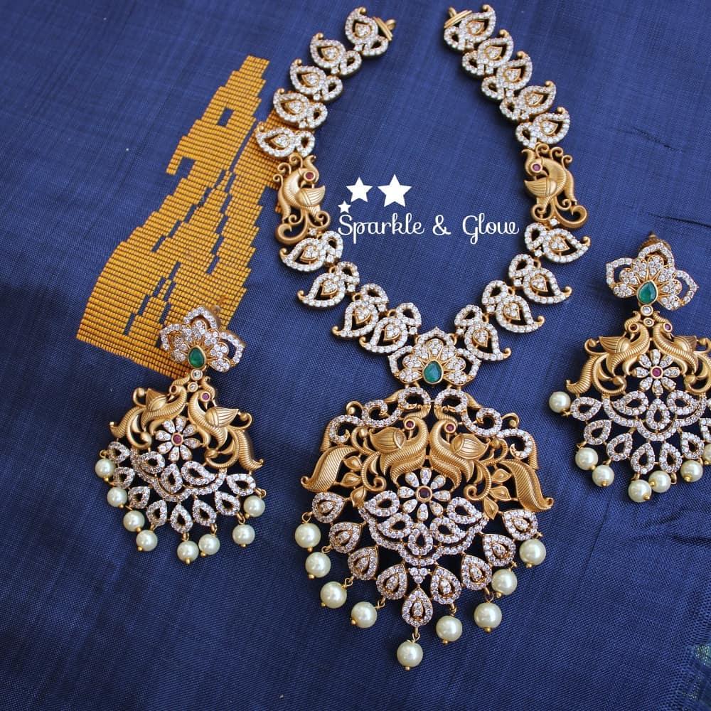 AD Stone Matte mango necklace with peacock carved pendent - Sparkle and Glow