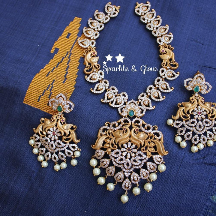 AD Stone Matte mango necklace with peacock carved pendent - Sparkle and Glow