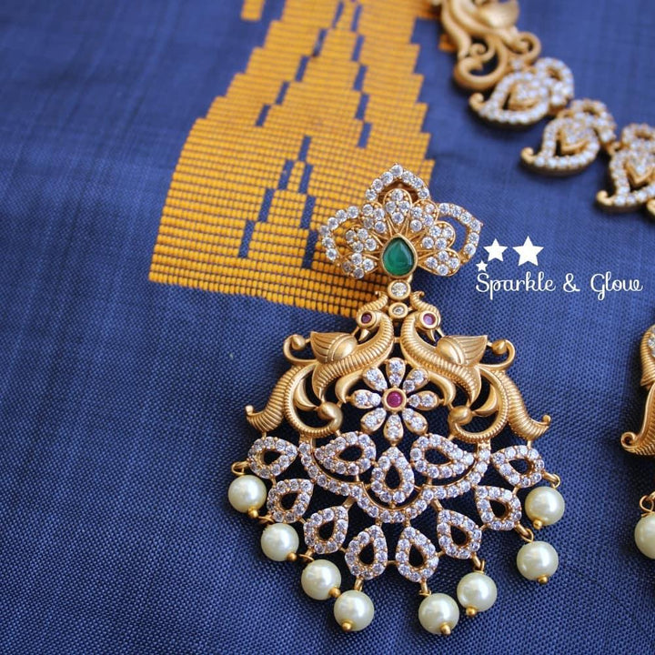 AD Stone Matte mango necklace with peacock carved pendent - Sparkle and Glow