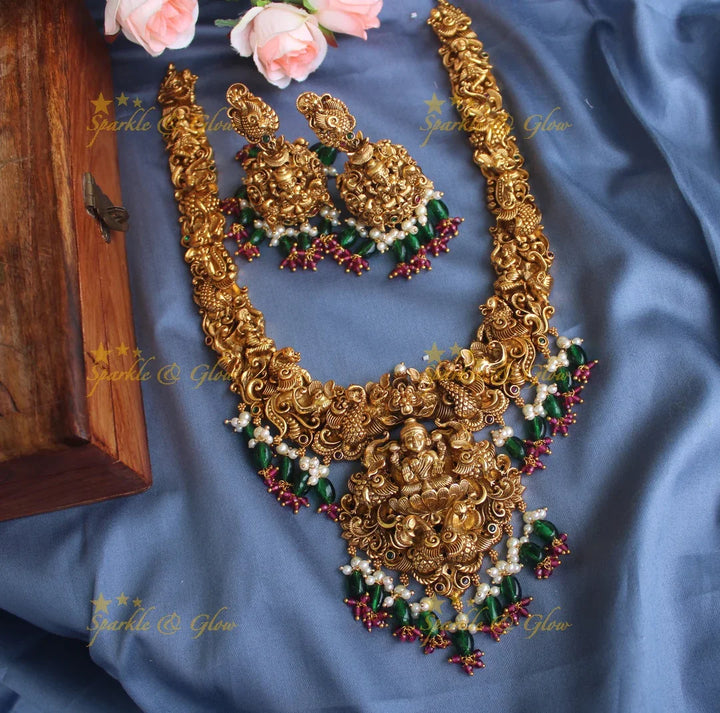 Exclusive Intricately 3 dimensional carved Lakshmi Haram - Sparkle and Glow