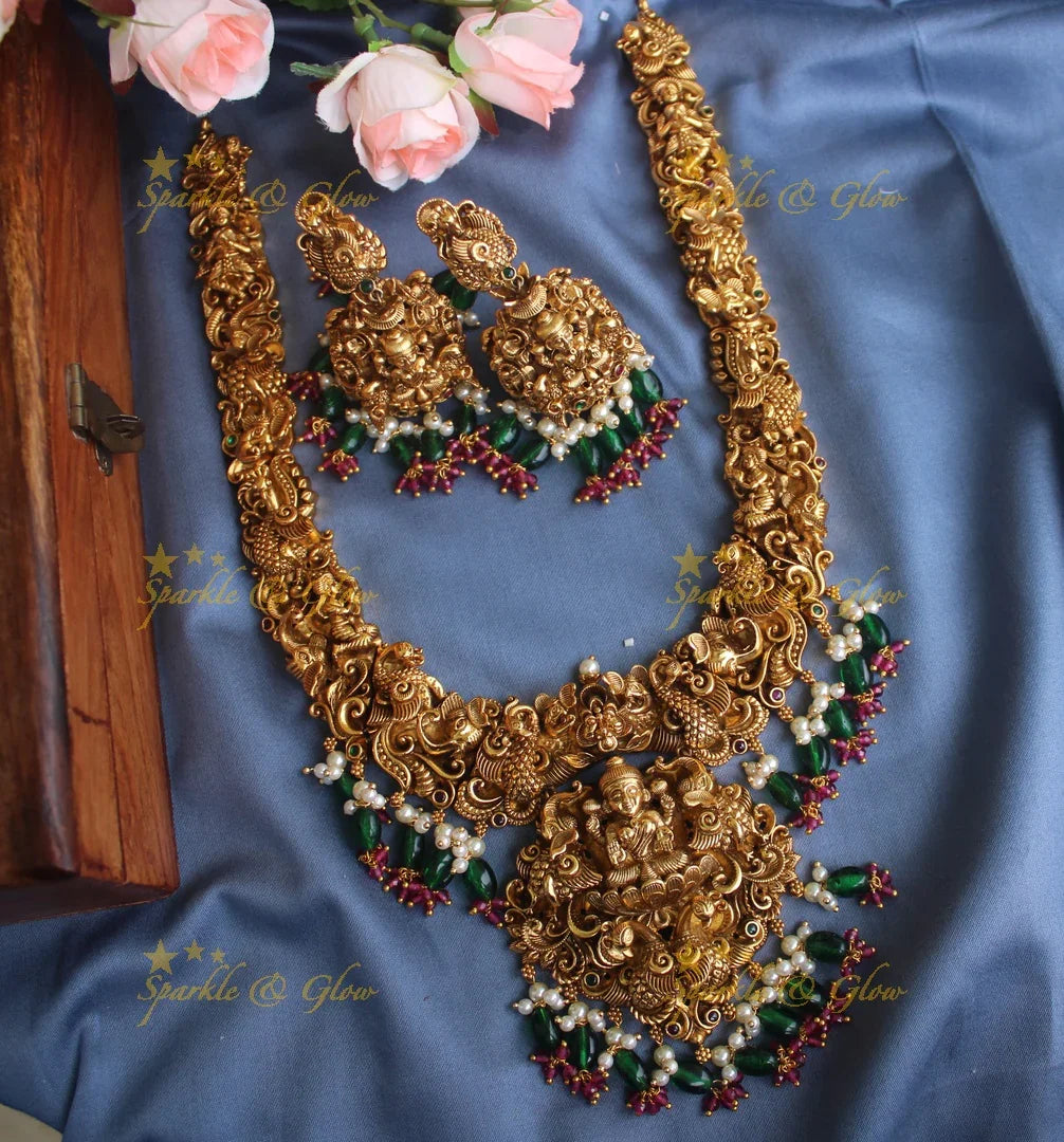 Exclusive Intricately 3 dimensional carved Lakshmi Haram - Sparkle and Glow