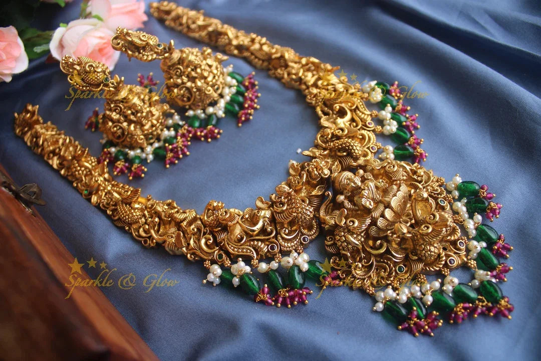 Exclusive Intricately 3 dimensional carved Lakshmi Haram - Sparkle and Glow