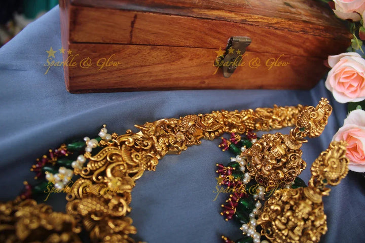 Exclusive Intricately 3 dimensional carved Lakshmi Haram - Sparkle and Glow