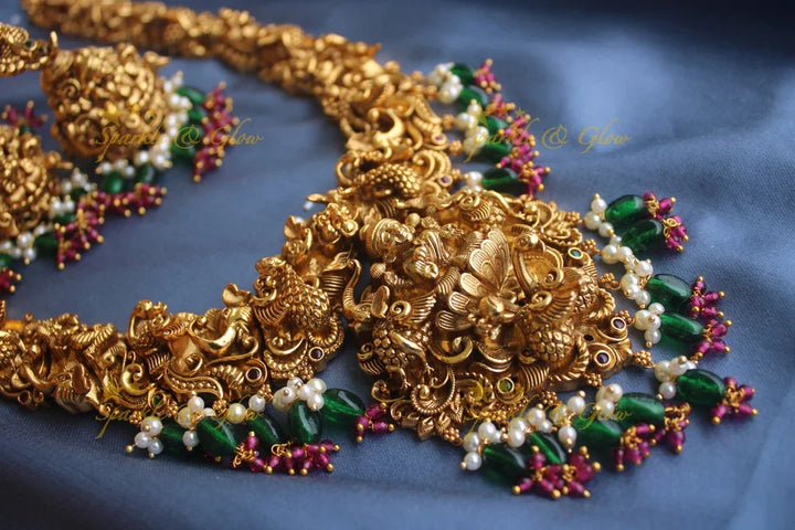 Exclusive Intricately 3 dimensional carved Lakshmi Haram - Sparkle and Glow