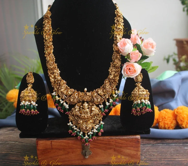 Exclusive Intricately 3 dimensional carved Lakshmi Haram - Sparkle and Glow