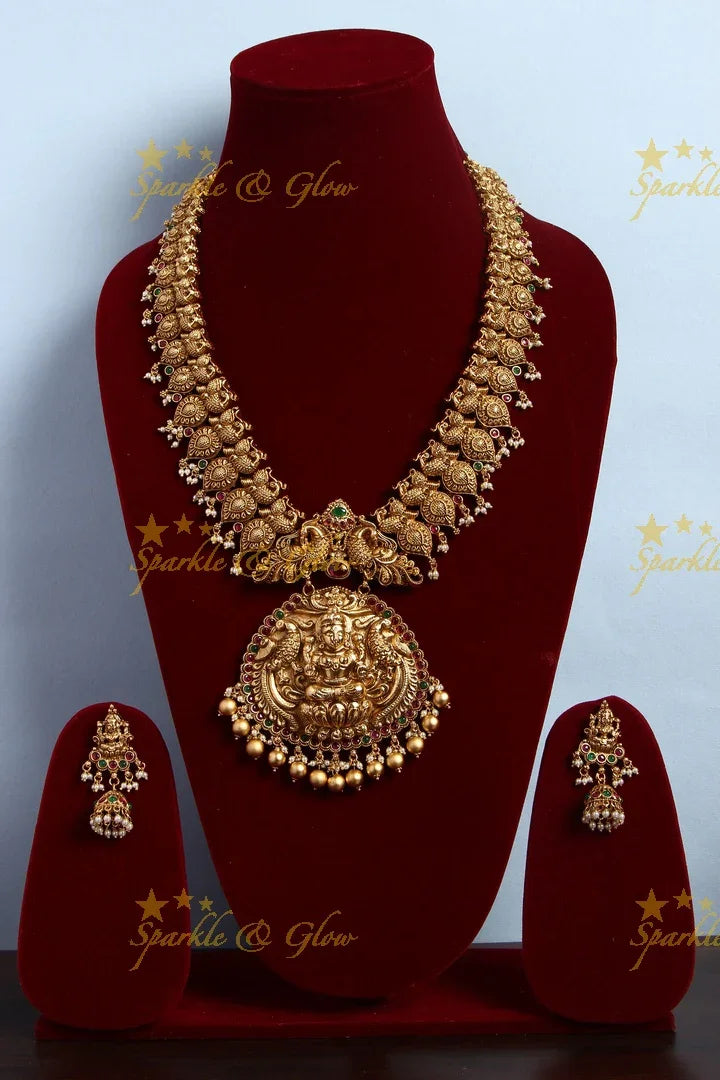 Gold alike Lakshmi Peacock carved haram - Sparkle and Glow