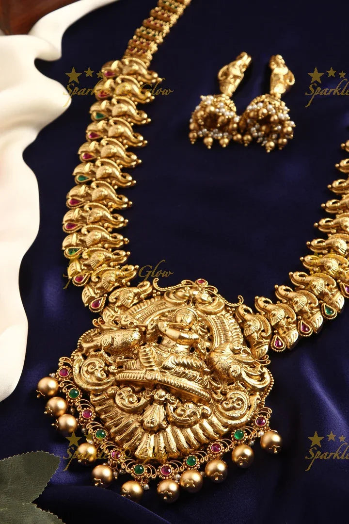 Gold alike Elegant Krishna playing flute and Peacock carved haram - Sparkle and Glow