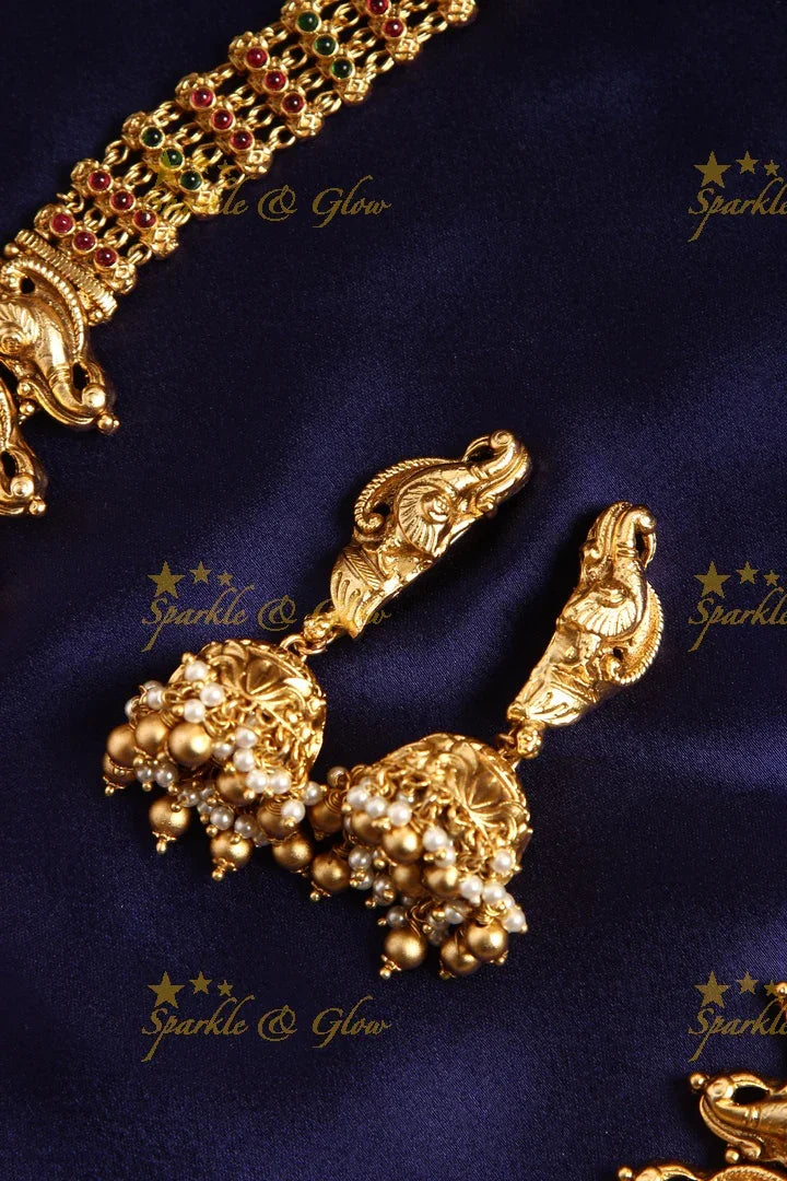 Gold alike Elegant Krishna playing flute and Peacock carved haram - Sparkle and Glow