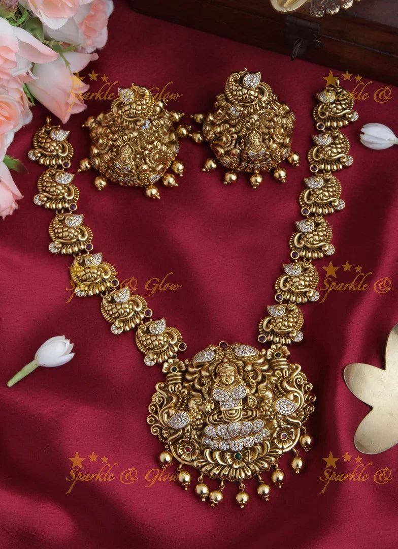Gold alike AD Stone Lakshmi Peacock Short Necklace - Sparkle and Glow