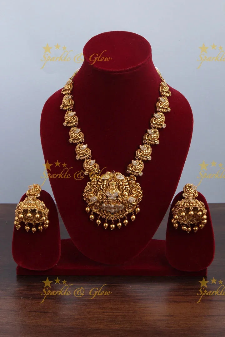 Gold alike AD Stone Lakshmi Peacock Short Necklace - Sparkle and Glow