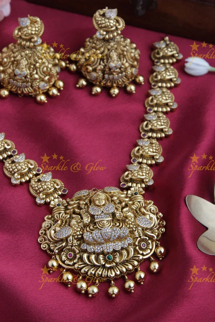 Gold alike AD Stone Lakshmi Peacock Short Necklace - Sparkle and Glow