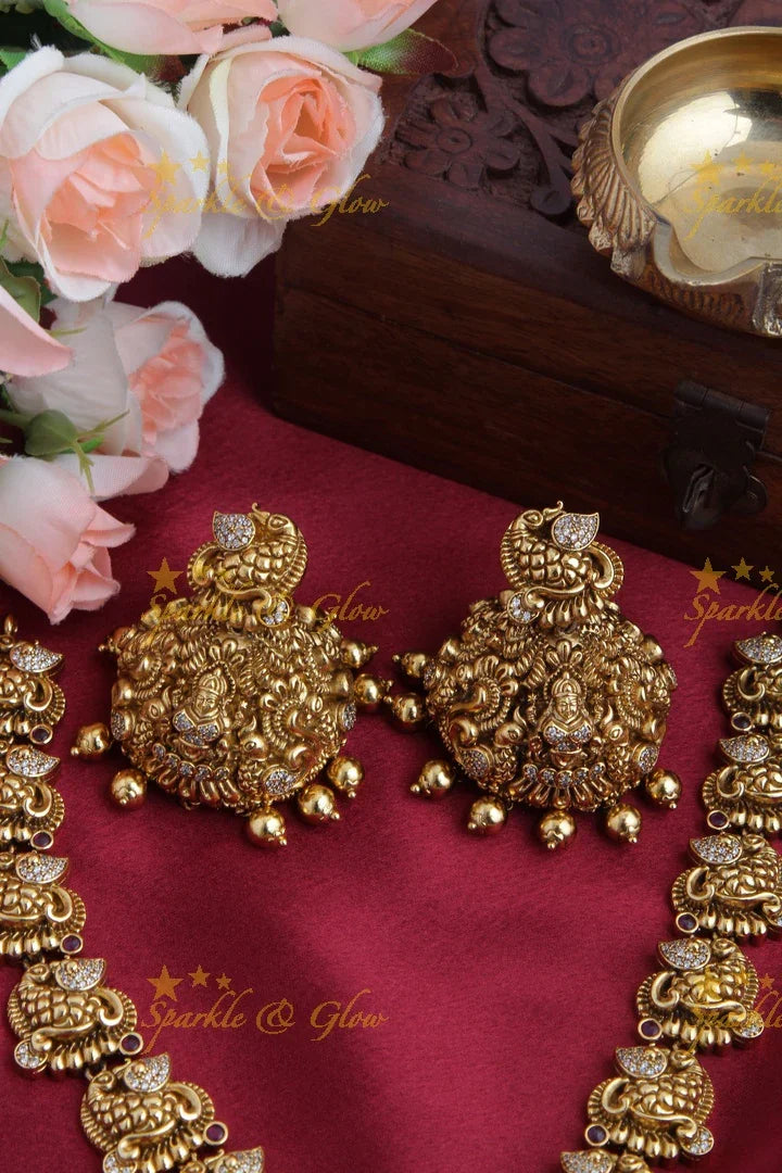 Gold alike AD Stone Lakshmi Peacock Short Necklace - Sparkle and Glow