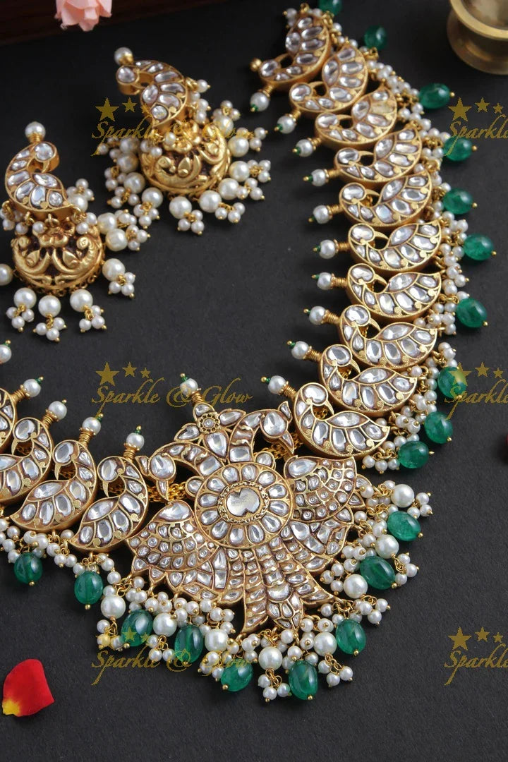Intricately Craved Peacock Necklace with Green Beads - Sparkle and Glow