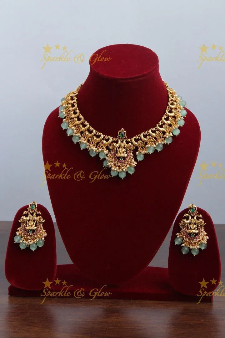 Matte gold lakshmi guttap pusalu with cz stones - Sparkle and Glow