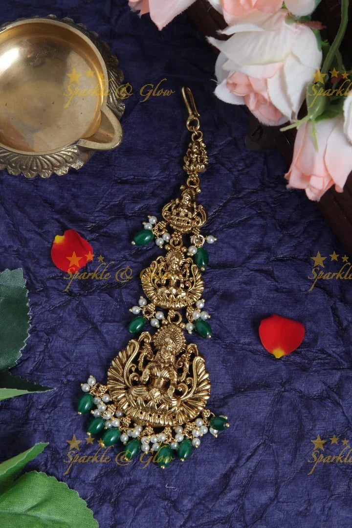Beautiful Lakshmi Maang Tikka with Pearls and green beads - Sparkle and Glow