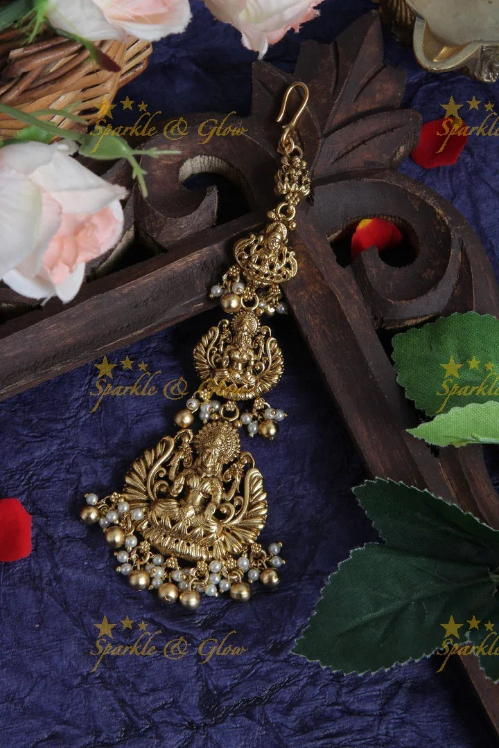 Beautiful Lakshmi Maang Tikka with Pearls and green beads - Sparkle and Glow