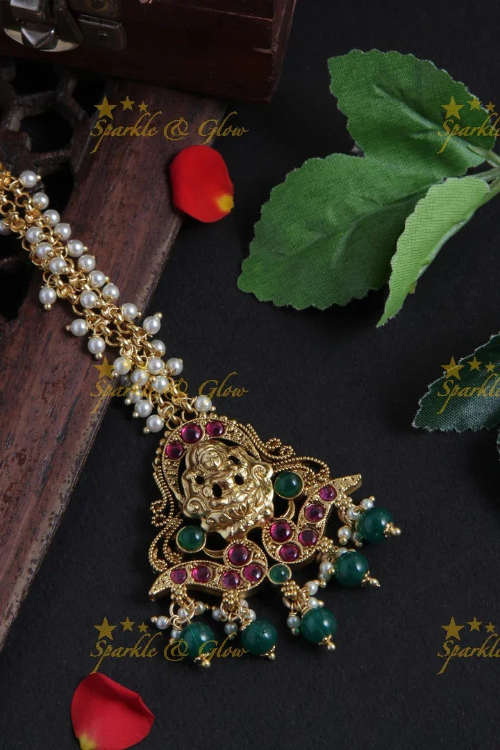 Beautiful Lakhsmi Maang Tikka with Green beads - Sparkle and Glow