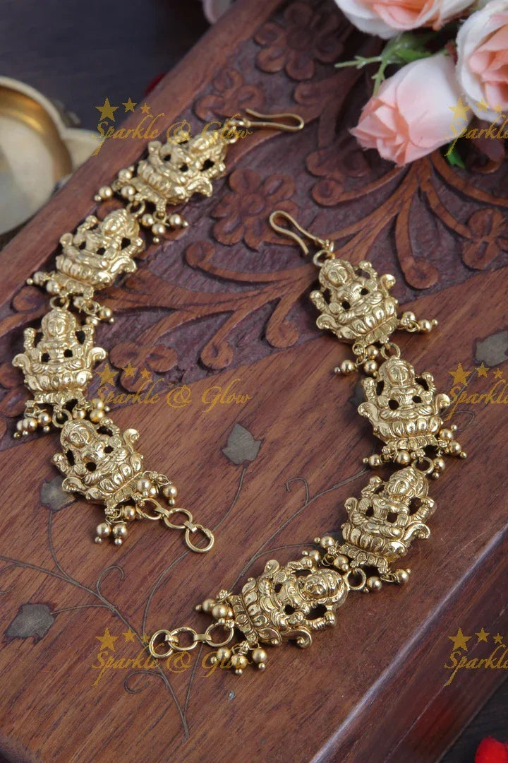 Beautiful Lakshmi Earchain with Gold beads - Sparkle and Glow