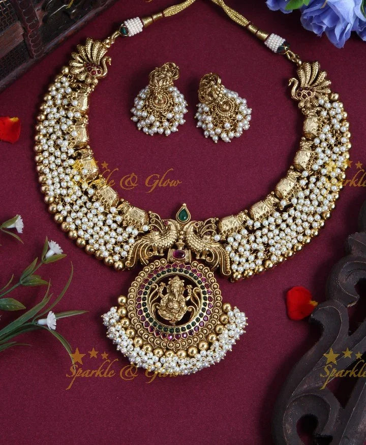 Gold Alike Polished Pearl Cluster Idol Ganesha Pendant Short Neckpiece - Sparkle and Glow