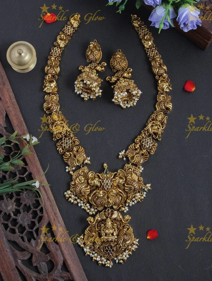 Intricately Carved Gold Alike Polished Peacock Lakshmi Gutta Pusalu Haram - Sparkle and Glow