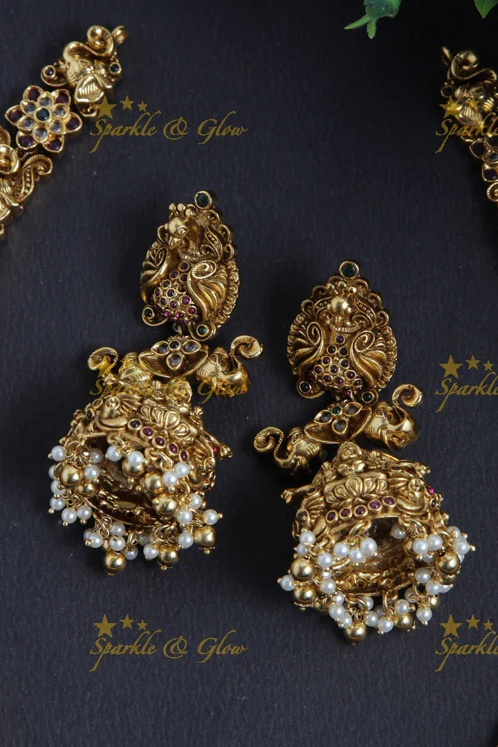 Intricately Carved Gold Alike Polished Peacock Lakshmi Gutta Pusalu Haram - Sparkle and Glow