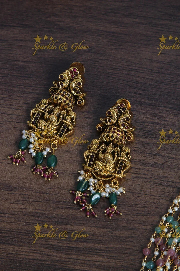 Multilayered pink green beads pearl haram with beautiful Gold alike Lakshmi Ganesha Saraswathi carved pendent - Sparkle and Glow