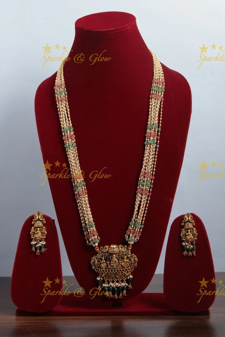 Multilayered pink green beads pearl haram with beautiful Gold alike Lakshmi Ganesha Saraswathi carved pendent - Sparkle and Glow