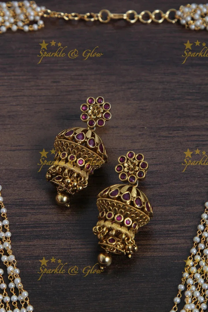 Multilayered Pearl Haram with beautiful Lord Radha Krishan Plaing flute pendent - Sparkle and Glow