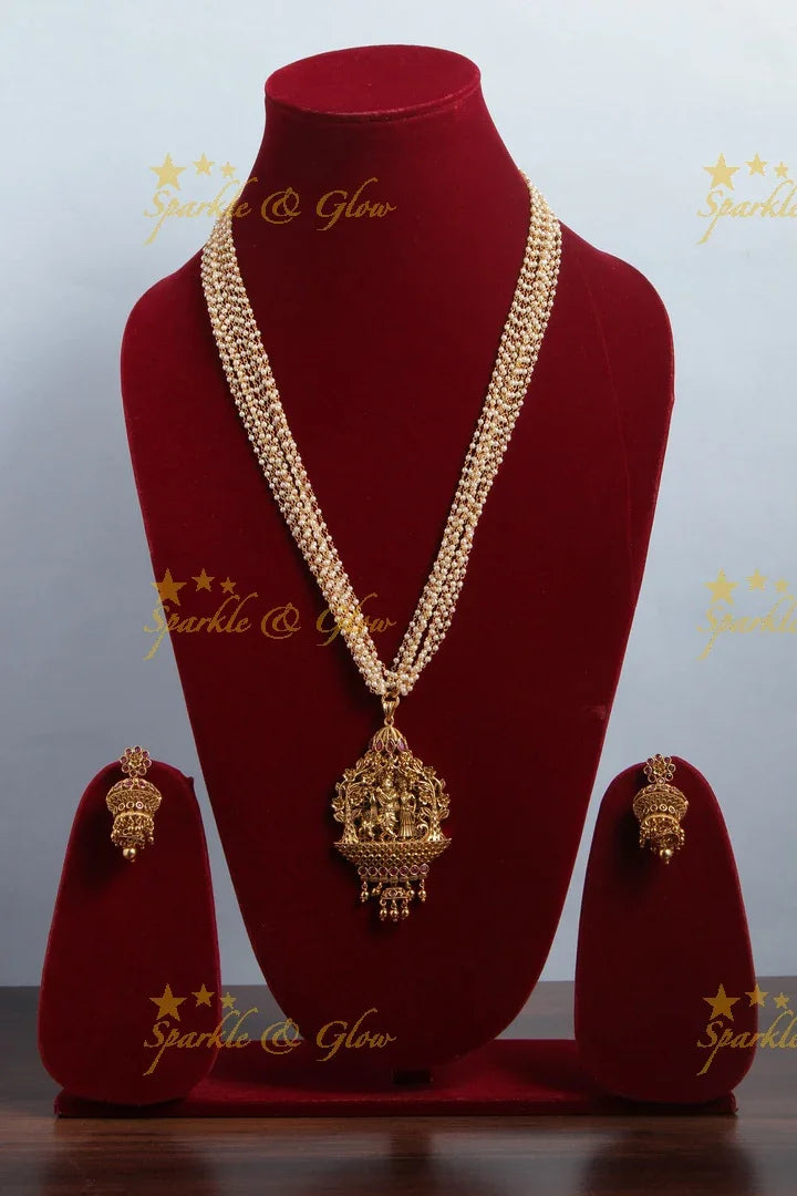 Multilayered Pearl Haram with beautiful Lord Radha Krishan Plaing flute pendent - Sparkle and Glow