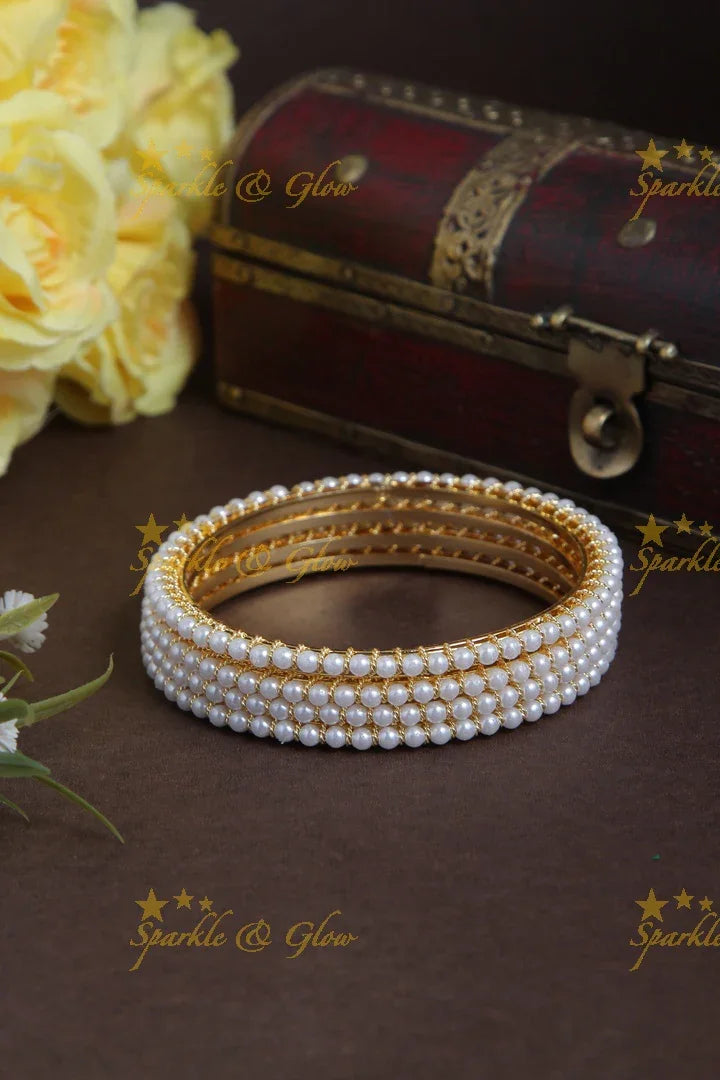 Budgetted pearl bangles set of 4 - Sparkle and Glow