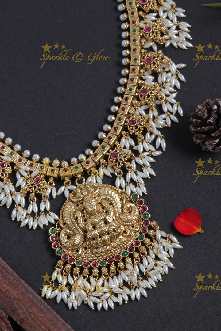 Gold alike long lakshmi carved rice pearl gutta pusalu necklace - Sparkle and Glow