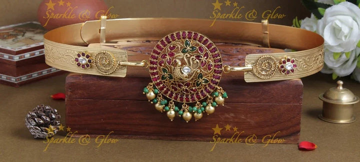 Intricately carved peacock pendent with plain hipbelt - Sparkle and Glow