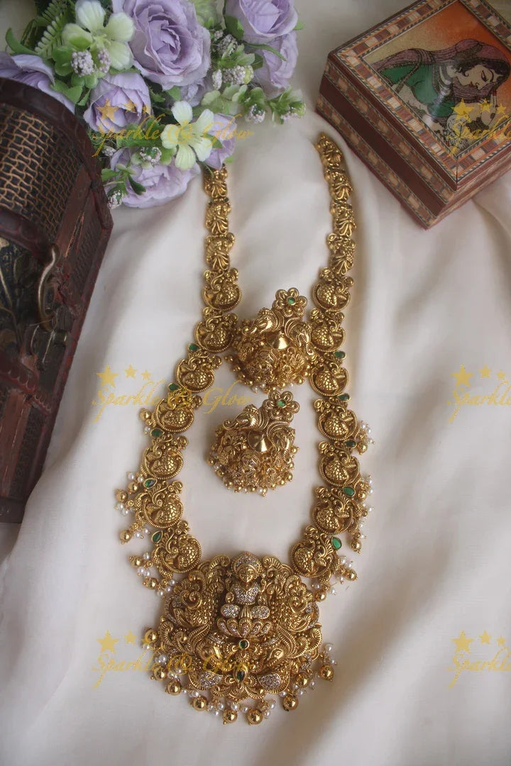 Beautiful gold alike peacock Lakshmi carved pendent long necklace - Sparkle and Glow