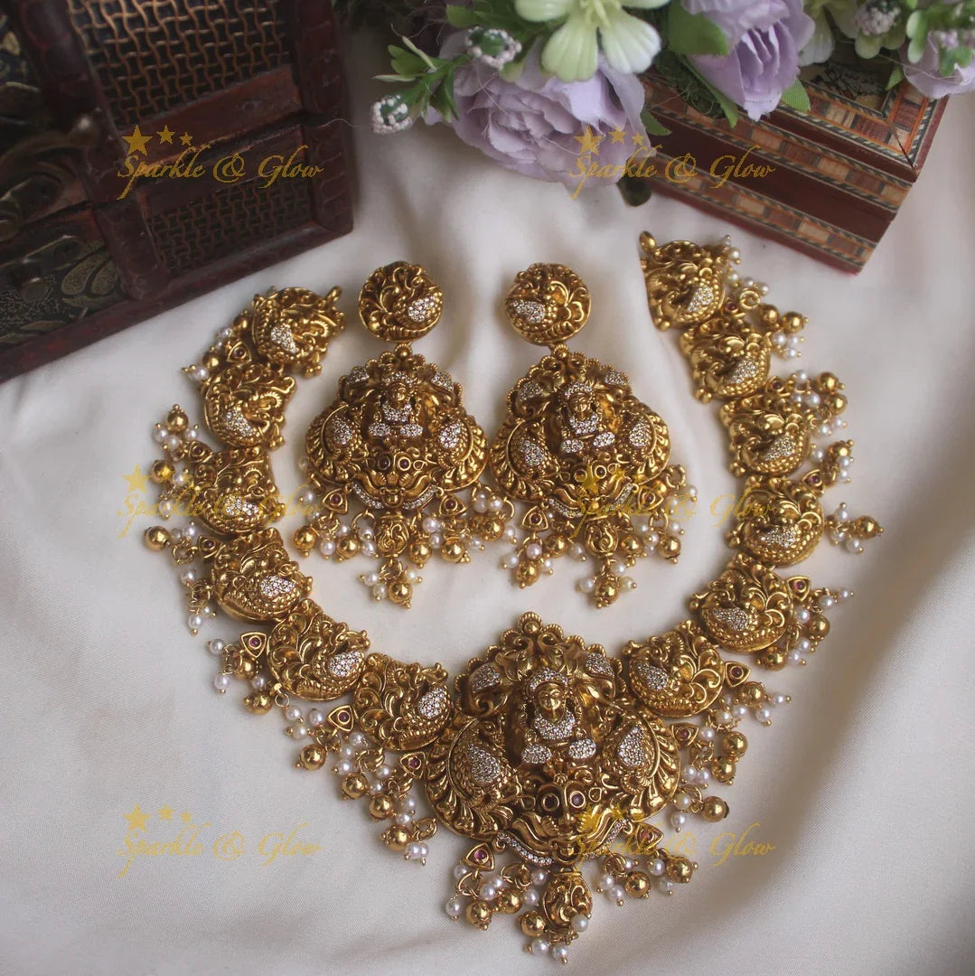 Gold alike peacock style necklace with Lakshmi pendent and gold beads - Sparkle and Glow