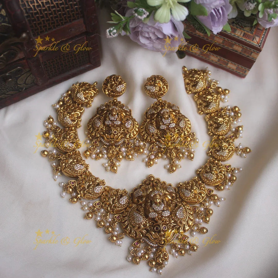 Gold alike peacock style necklace with Lakshmi pendent and gold beads - Sparkle and Glow