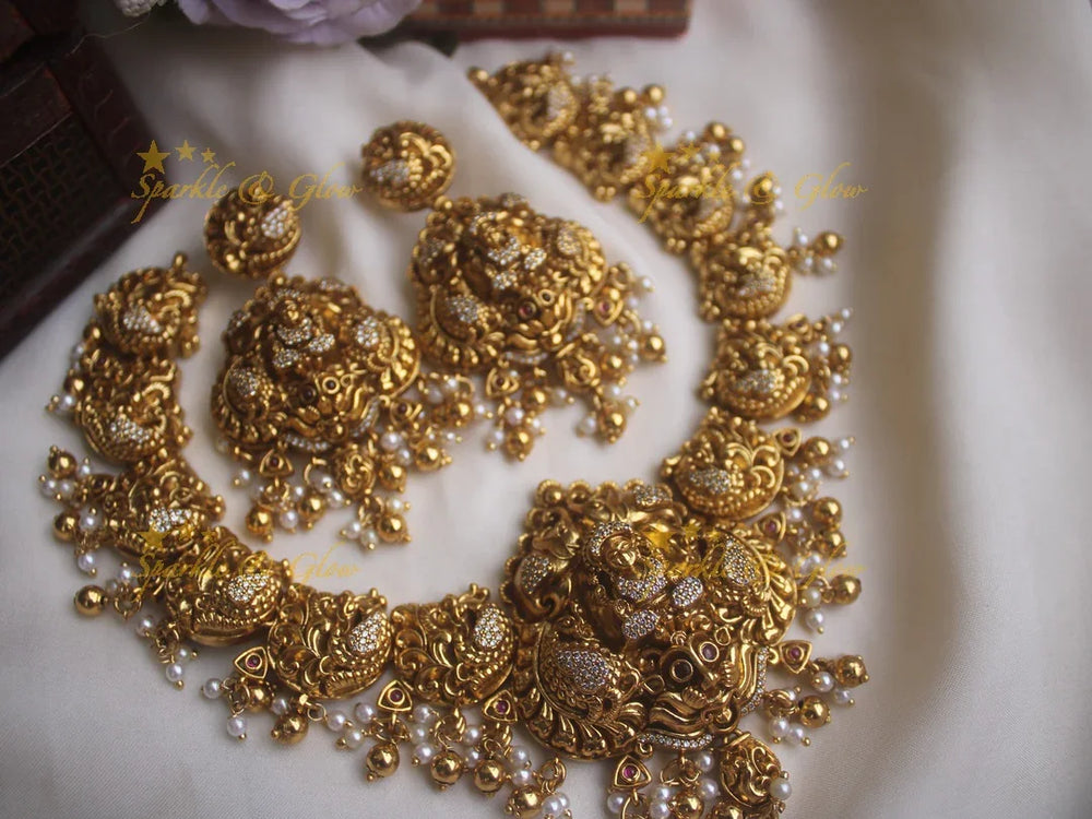 Gold alike peacock style necklace with Lakshmi pendent and gold beads - Sparkle and Glow