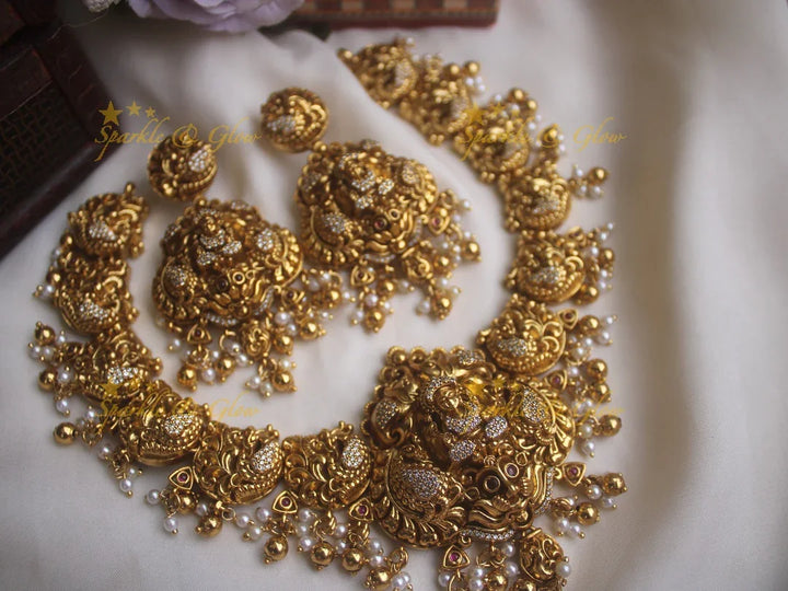 Gold alike peacock style necklace with Lakshmi pendent and gold beads - Sparkle and Glow