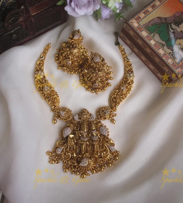 Intricate gold alike necklace with lord krishna playing flute with Radha pendent - Sparkle and Glow
