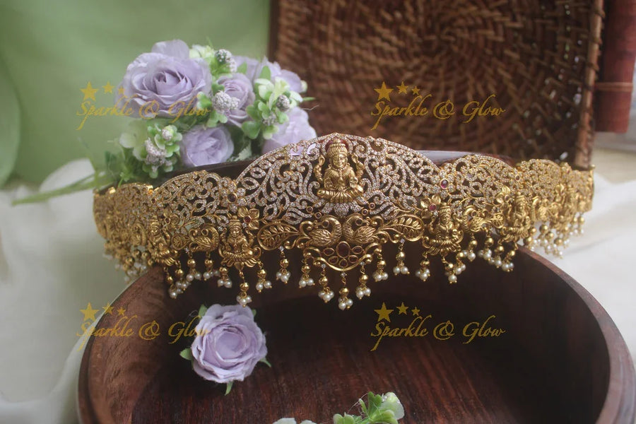 Gold alike AD stone lakshmi dancing peacock carved hipbelt - Sparkle and Glow